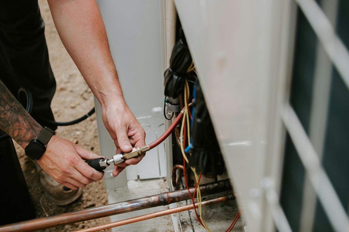A tradesperson at work on a job